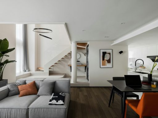 black wooden coffee table near white couch