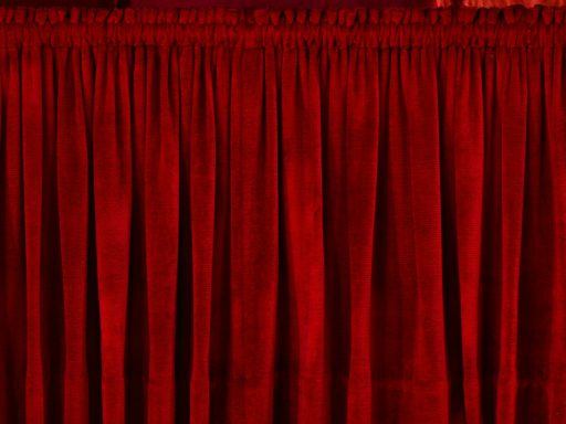 closeup photo of red rod pocket curtain
