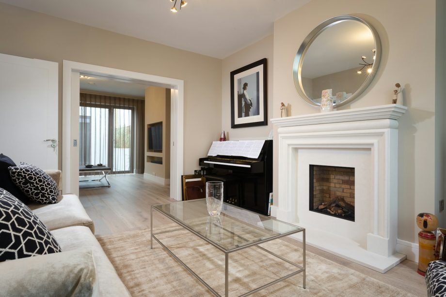 a living room with a fireplace