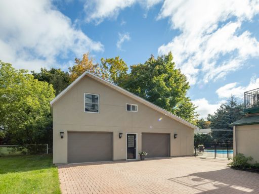 a house with a pool in the back yard