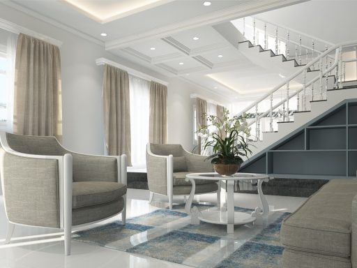 Kleine woon-werkkamer met een compacte bureauhoek en een gezellige woonzone gescheiden door verlichting en een vloerkleed